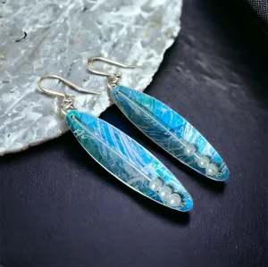 Blue/green seaweed peal pod style earrings