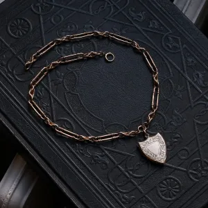 Edwardian Gold Shield Locket on Trombone Link Chain