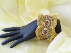 Indian Jewelry: Statement bracelet, bridal, red, green, white stone Jewellery. "Flower Princess"- Gold plated party or wedding broad bracelet bangle.  From Artikrti