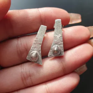Pair of unique handcrafted earrings, Asymmetrical, textured design, triangular shape,tear drop detail,hammered finish, artisanal,silver, 925
