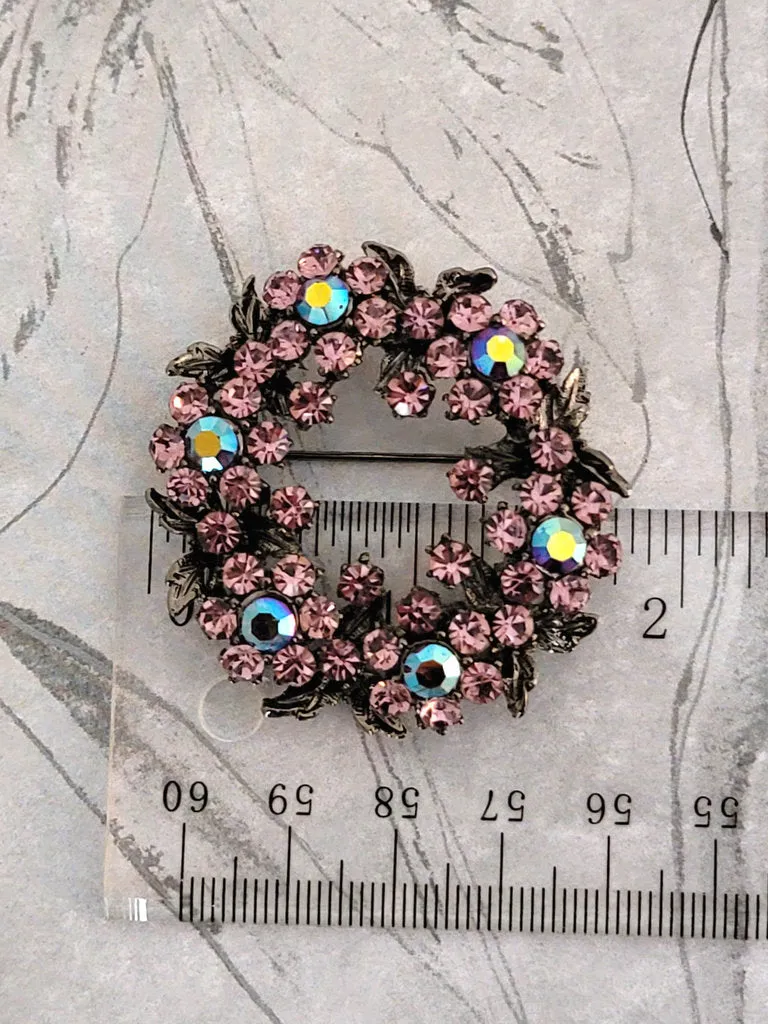 Purple crystal rhinestone brooch, in gunmetal tone, with AB accents
