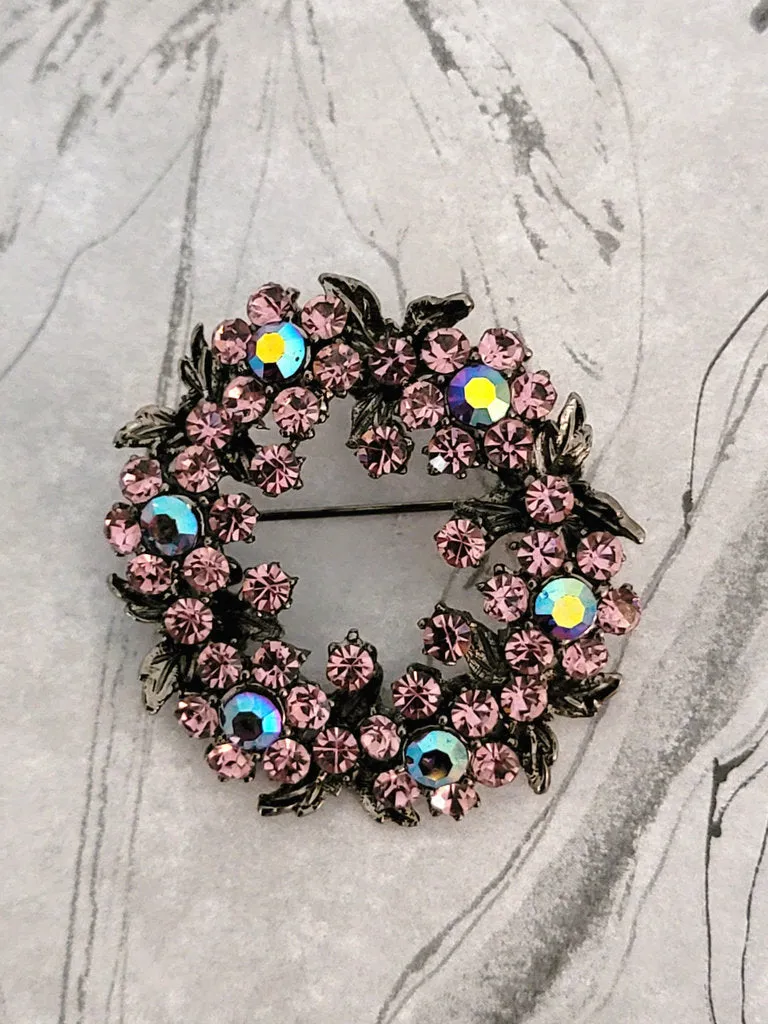 Purple crystal rhinestone brooch, in gunmetal tone, with AB accents