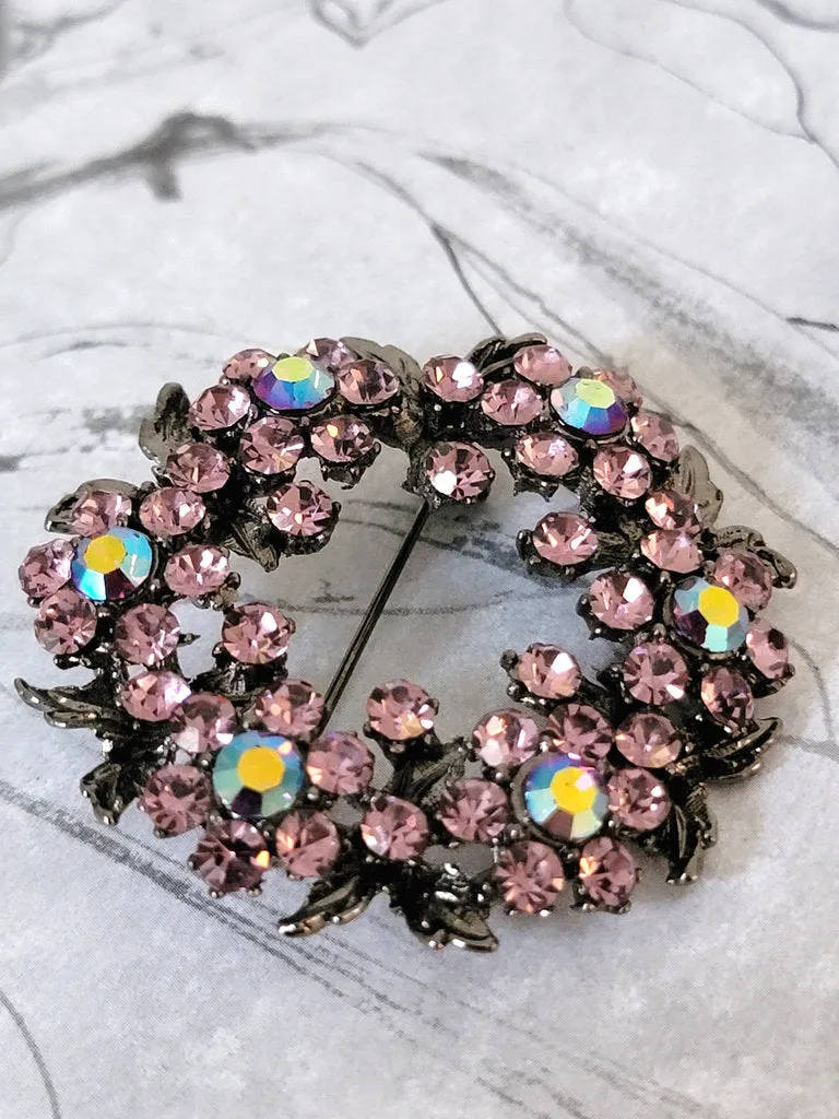 Purple crystal rhinestone brooch, in gunmetal tone, with AB accents