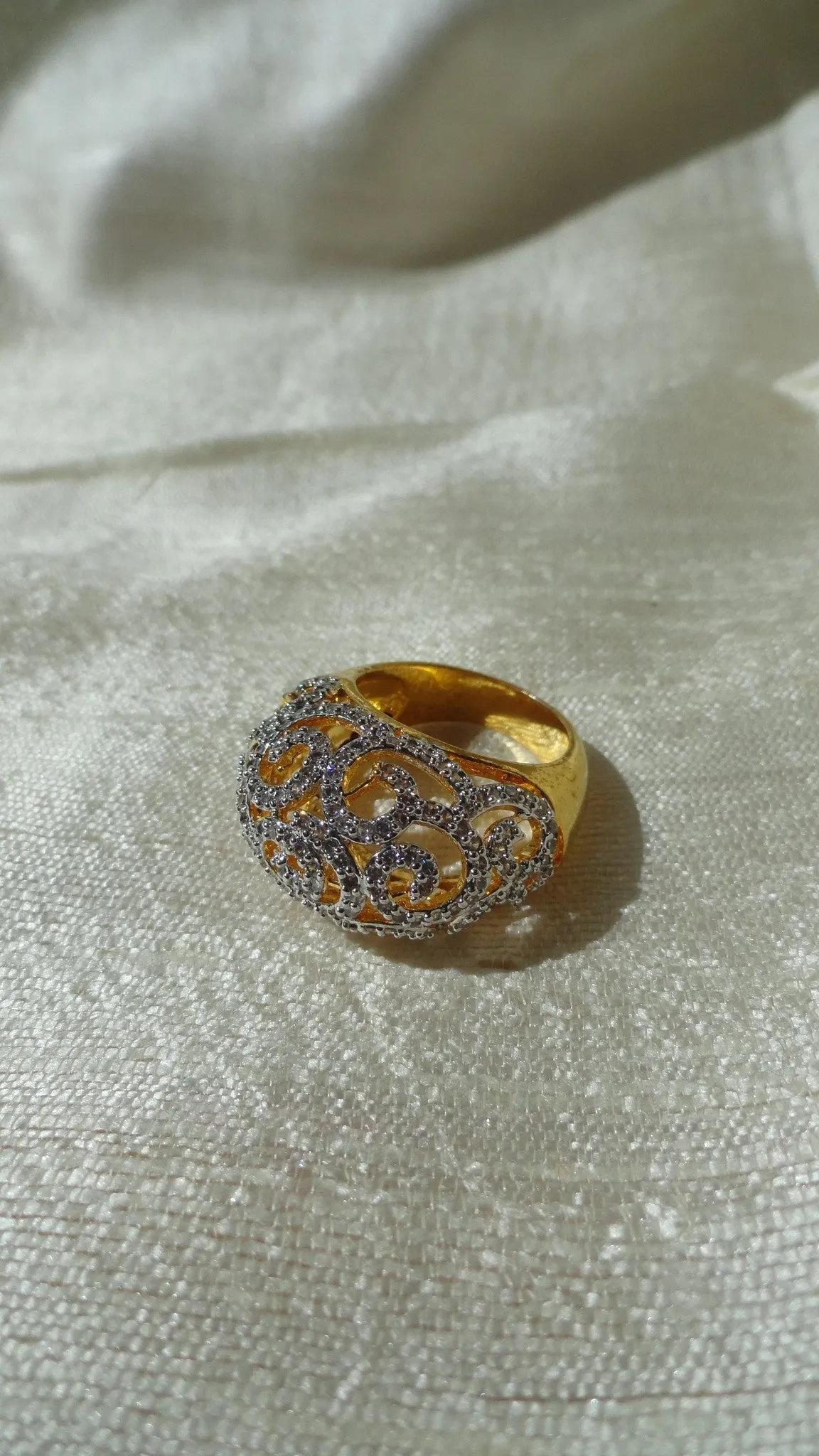 "Cascades" Ethnic finger ring. Indian finger ring with white stones in waves.  Brass finished gold Party or wedding ring. From Artikrti.