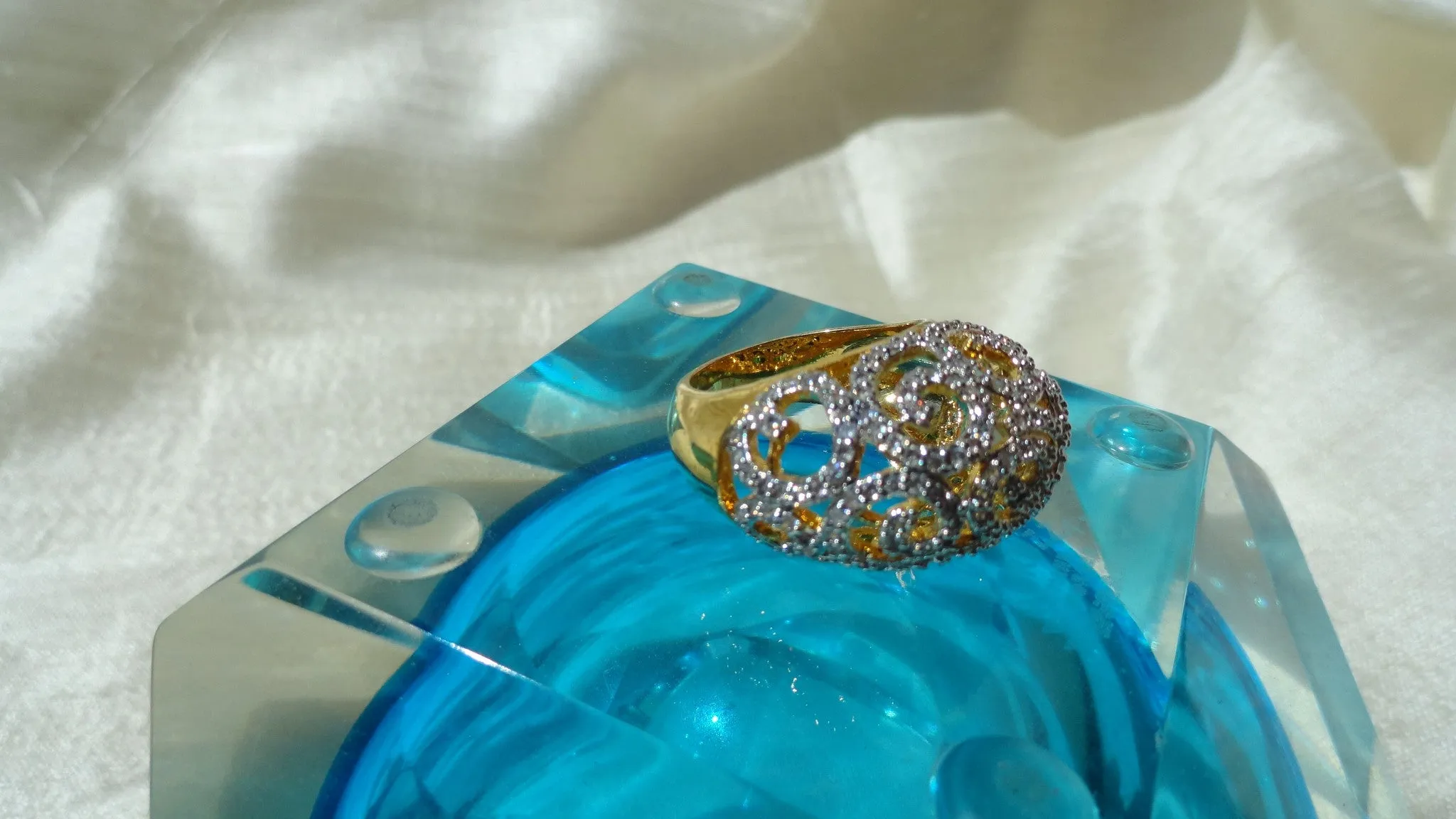 "Cascades" Ethnic finger ring. Indian finger ring with white stones in waves.  Brass finished gold Party or wedding ring. From Artikrti.