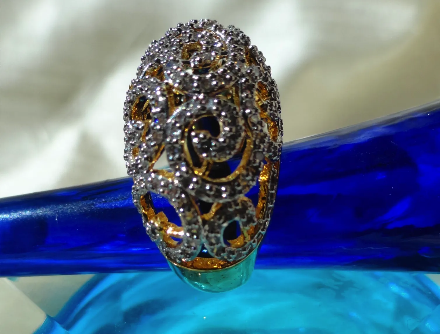 "Cascades" Ethnic finger ring. Indian finger ring with white stones in waves.  Brass finished gold Party or wedding ring. From Artikrti.