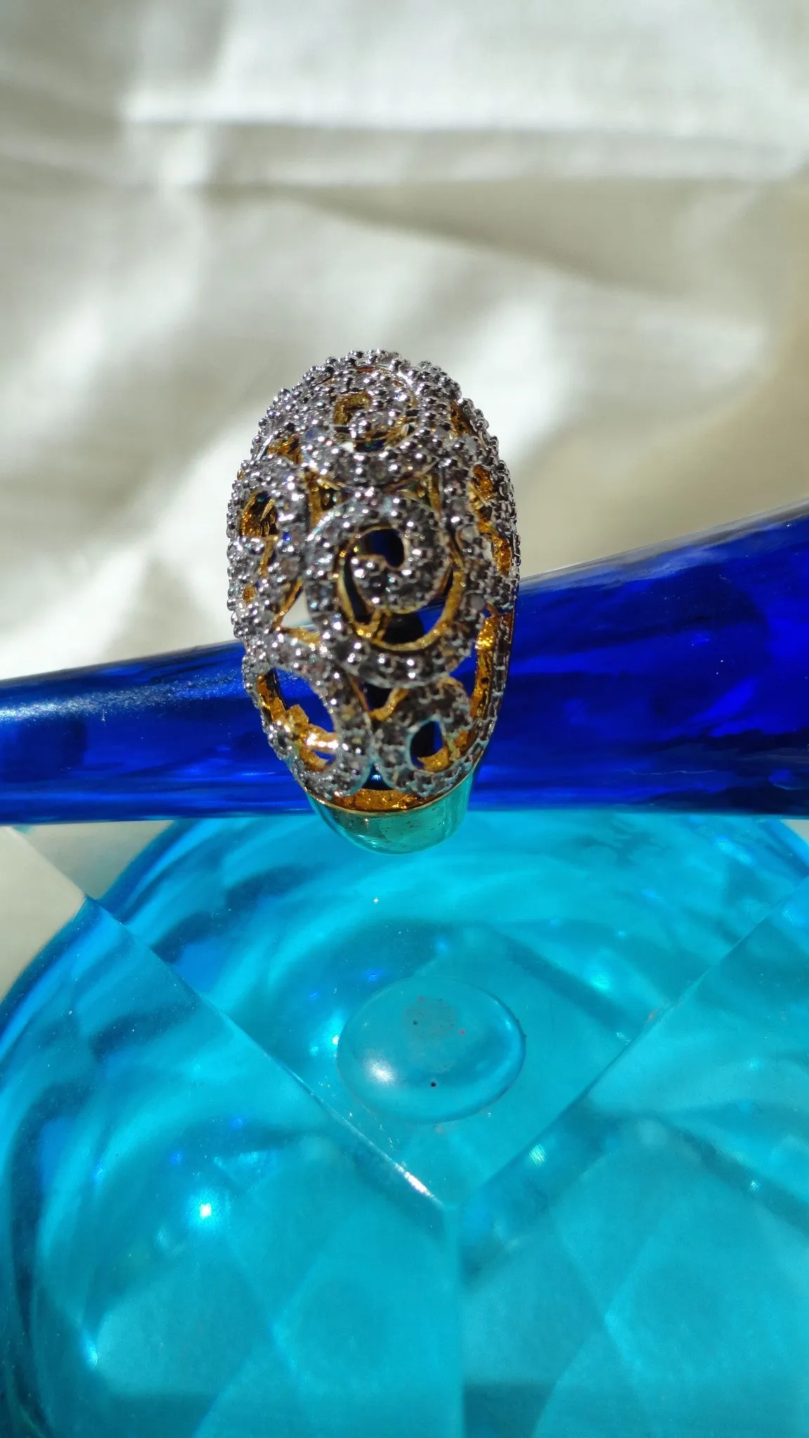 "Cascades" Ethnic finger ring. Indian finger ring with white stones in waves.  Brass finished gold Party or wedding ring. From Artikrti.