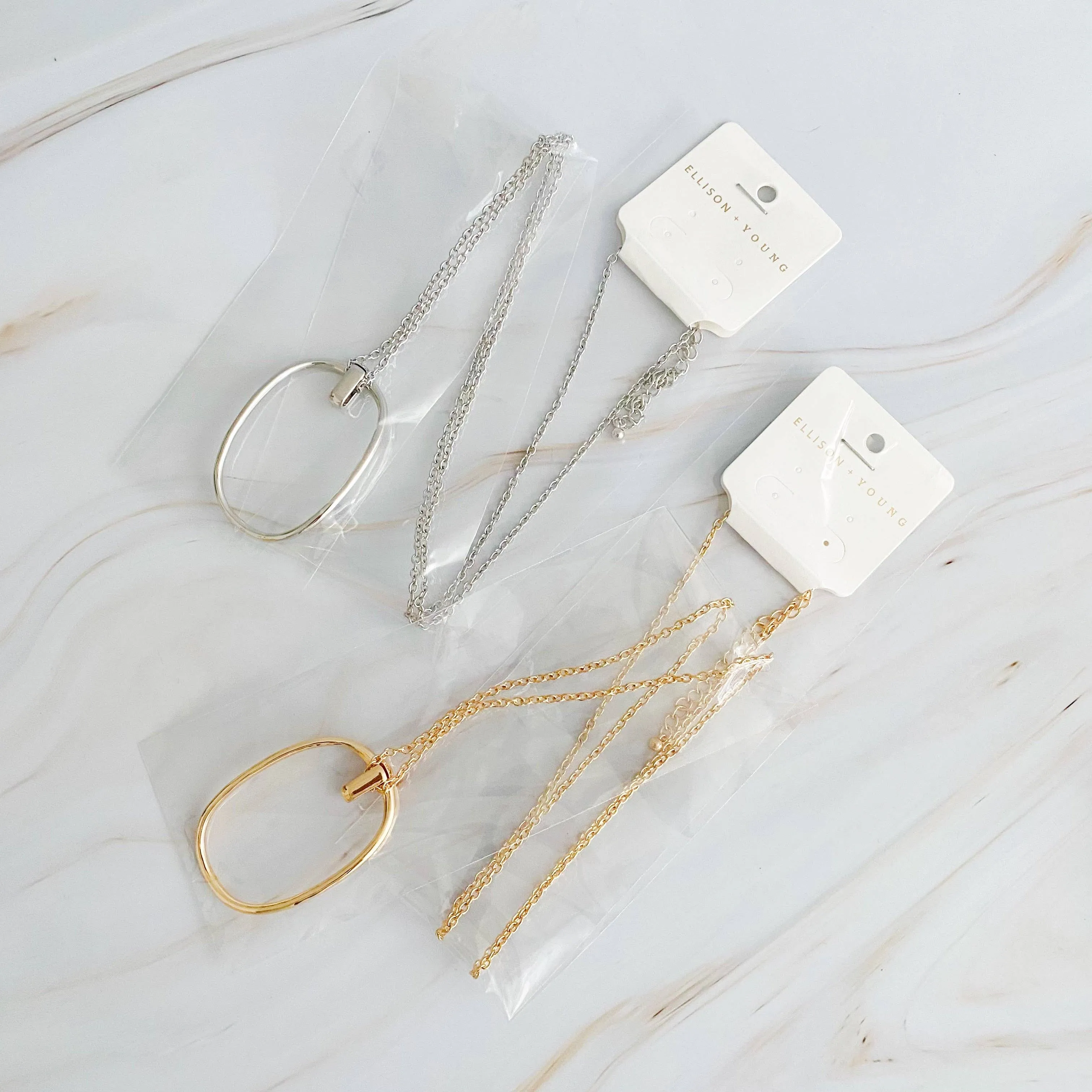 Sleek Oval Pendant Long Necklace: Gold