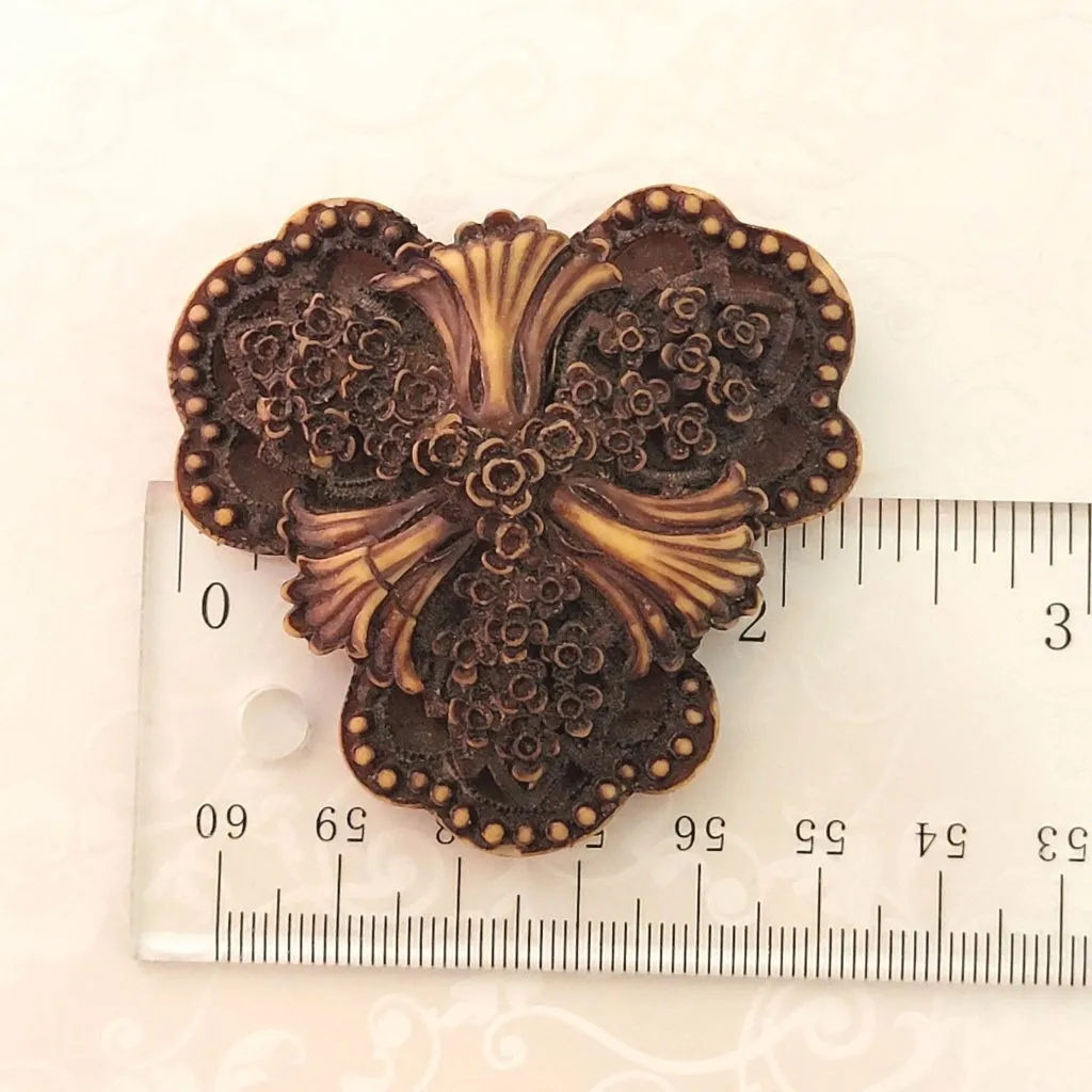 Vintage resin gothic flower brooch